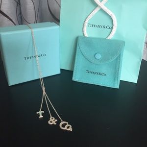 Tiffany & Co. drop dangle lariat sterling silver necklace with T & Co letters